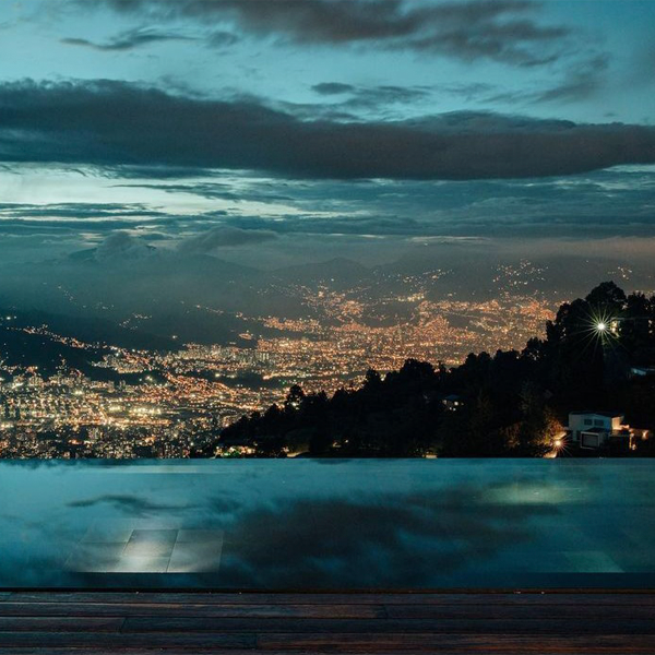 private infinity pool at night by SAM Buildings