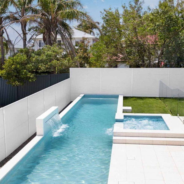 private swim lane with spa and waterfall