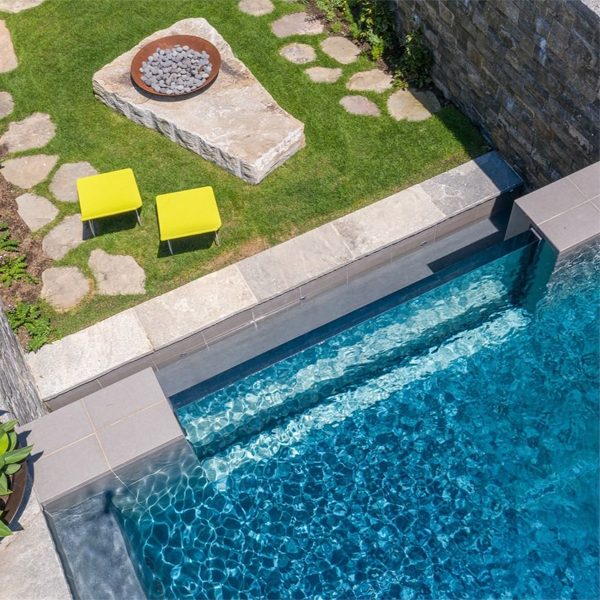 infinity pool with transparent window by Drakeley Pools