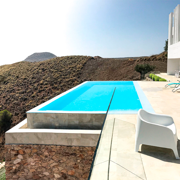 infinity pool in a top hill by Indalpool