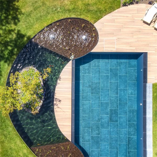 drone view of a Modern natural pool design, by Cockheyt Biopools