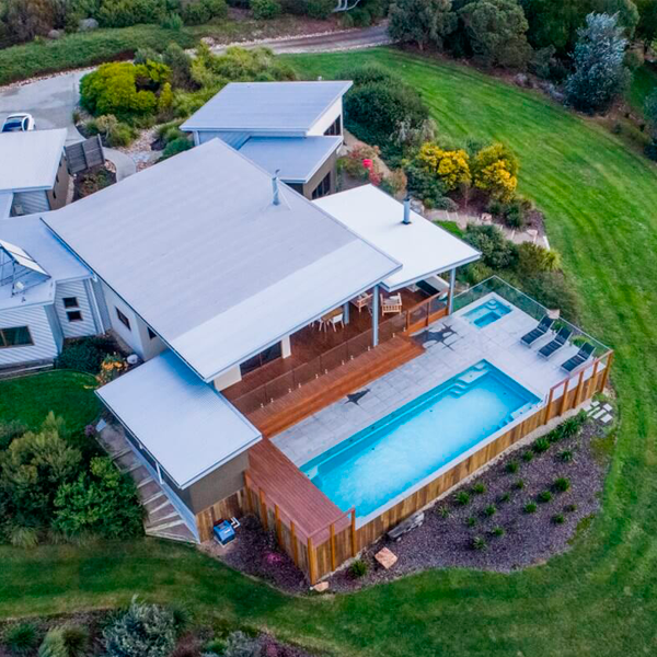 above ground pool surrounded by wood