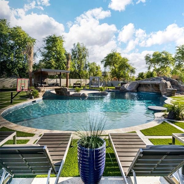 outdoor living space with a great pool by Sherwood Outdoors