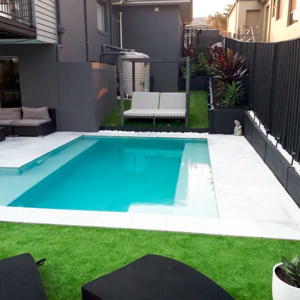 private pool in a small patio by Gold Coast Family Pools