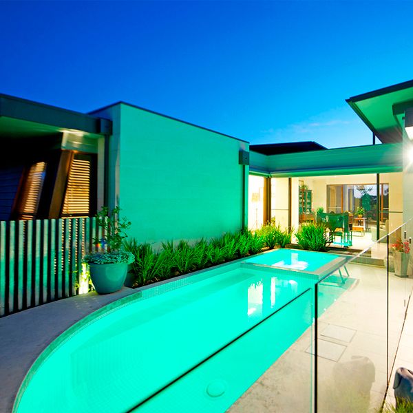 white custom pool with spa, by Icon Pools