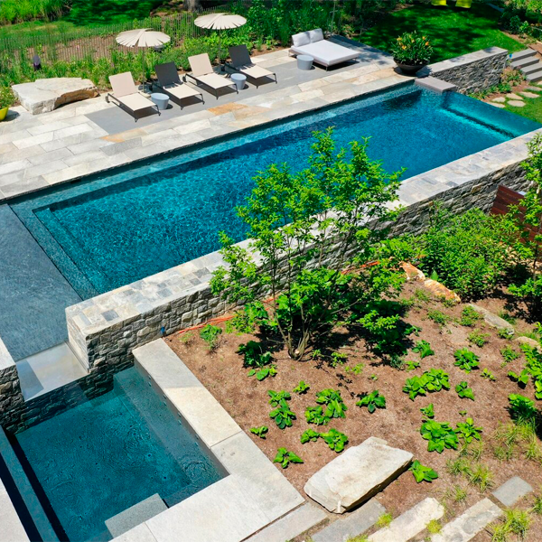 infinity pool with transparent window by Drakeley Pools