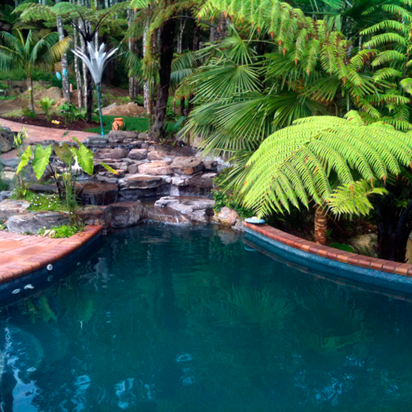 stone waterfall in custom pool