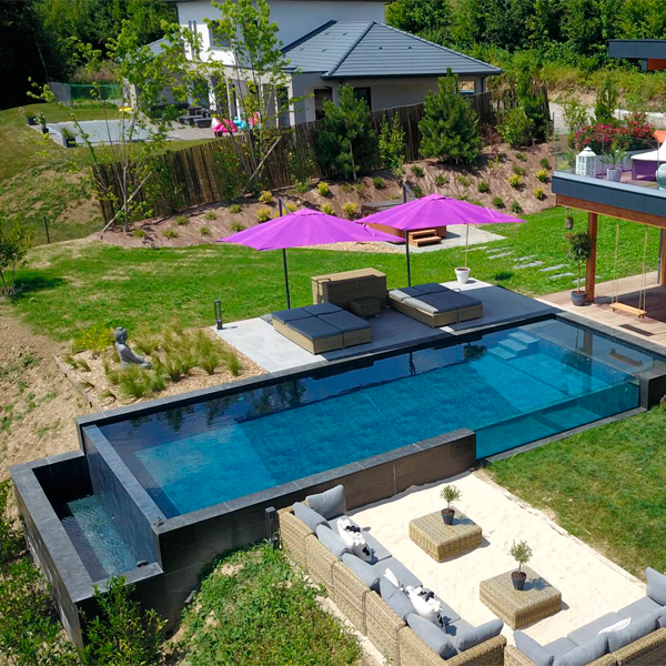 infinity pool with transparent window by Atelier Olea