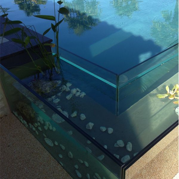 details of a unique transparent pool by Piscines et Concept
