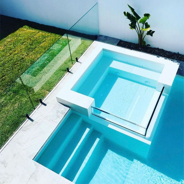mini pool and spa with transparent wall by MG Pools