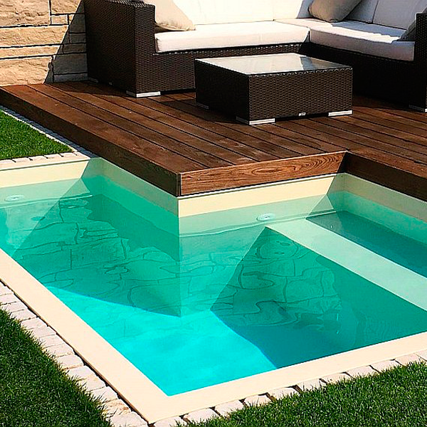 small swimming pool and wood deck