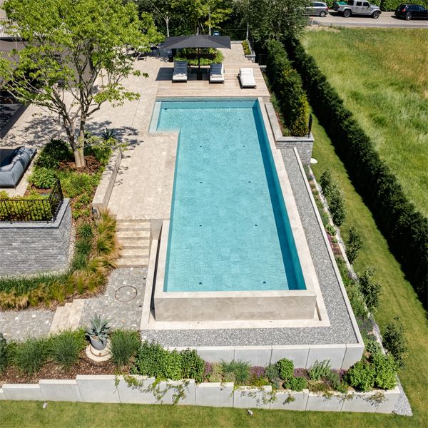 drone view of a custom infinity pool by Vivell Schwimmbadtechnik