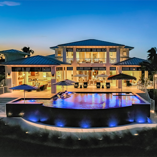 lighted custom infinity pool with spa by D´Asign Source