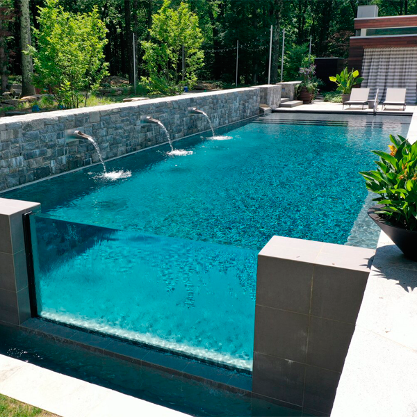 infinity pool with transparent window by Drakeley Pools