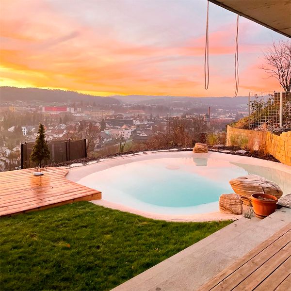 sand natural pool by Beach Pool, at sunset, in a private house