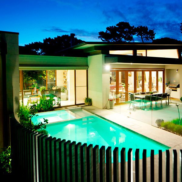 white custom pool with spa, by Icon Pools