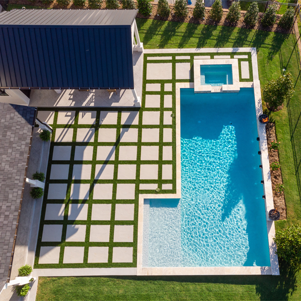 private pool and spa drone view by Spartan Pool Patio