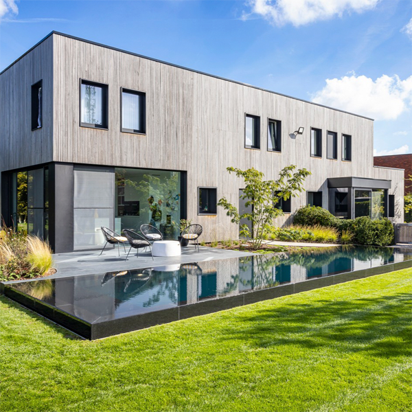 black mirror pool in a modern house with a huge garden, by Art Pools