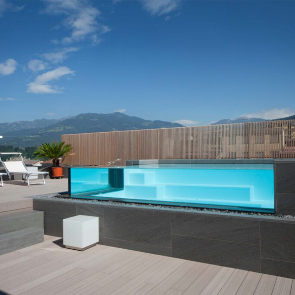 above ground transparent infinity pool in a rooftop by Teknopiscine