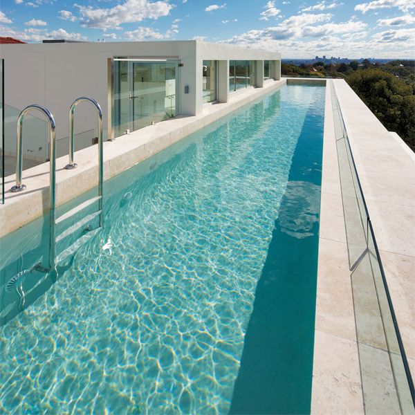 Custom rooftop lap pool, by Artesian Pools