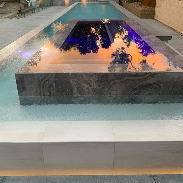 built-in spa in a modern and minimalist pool by Graziani Pools