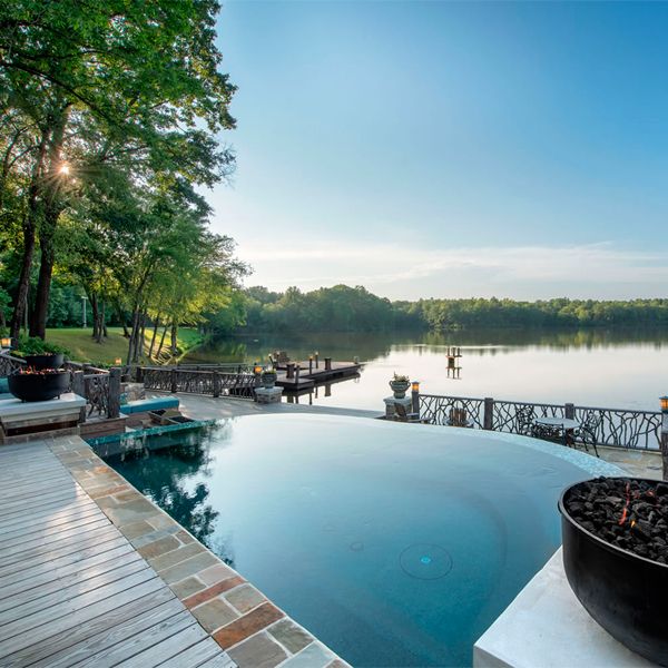 Lake view from a custom infinity mini pool by Crystal Pools
