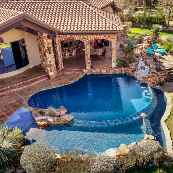 private overflow pool by Hines Pools