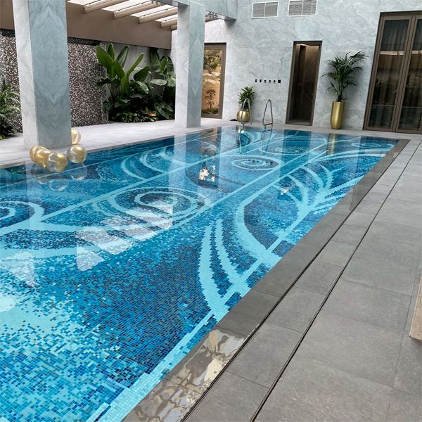 indoor pool, with a mobile floor of a unique design in glass mosaic tile, by Unik Pools