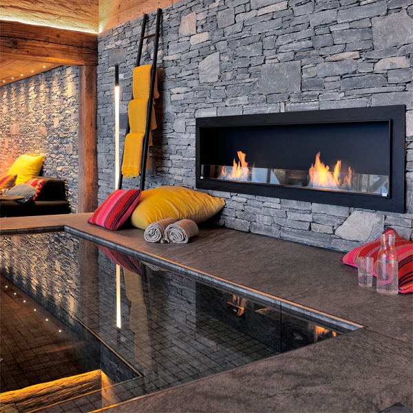 indoor infinity pool and spa by Piscines Concept