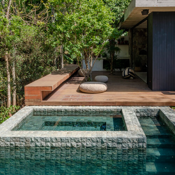 spa in a vacation villa pool by Macro Arquitetos