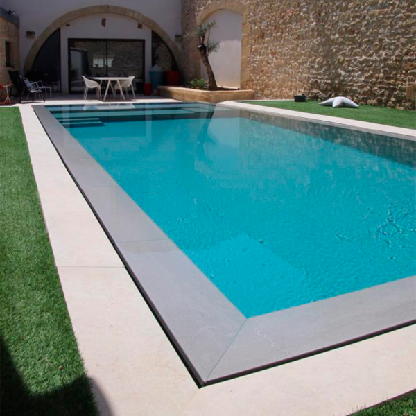 mirror infinity pool by Azur Composites Piscines Sonerem