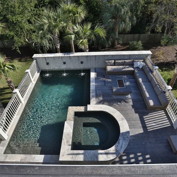 drone view of a custom pool and spa, by Aqua Blue Pools