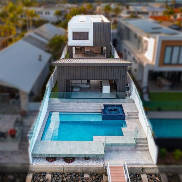 vue drone piscine privée et spa par JM Built